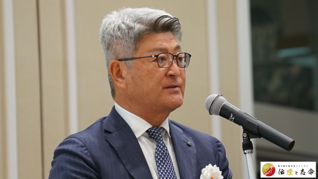 東京海上日動火災保険株式会社 常務執行役員　小西 孝久 氏が登壇している様子