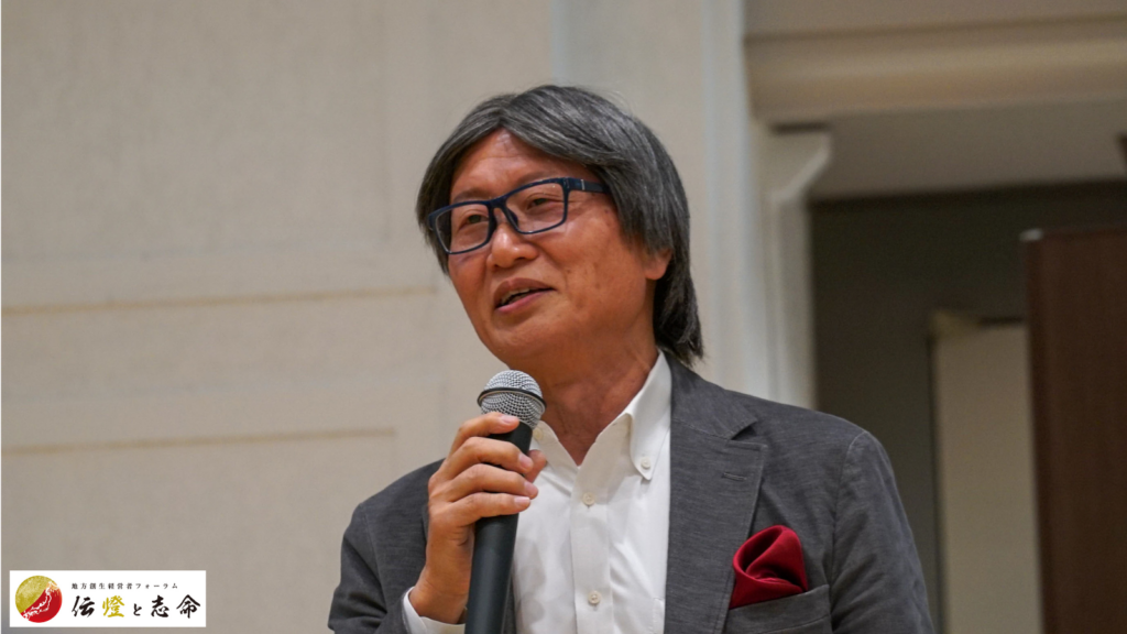新潟大学 教授　藤巻 義博 先生が演説している